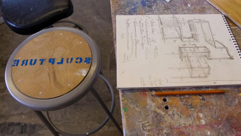 Art drawing with sculpture label stool